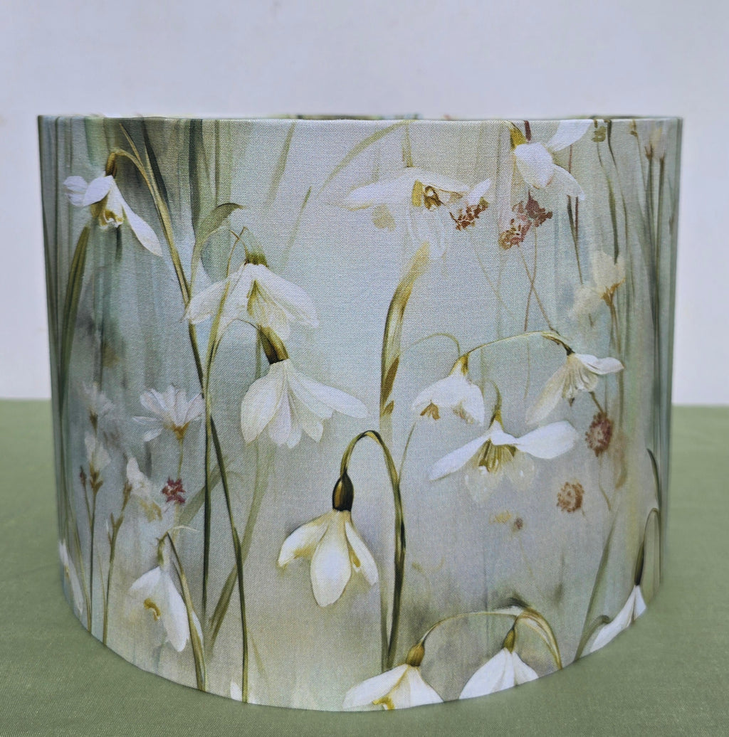 handmade drum lampshade with cotton snowdrop fabric in pale green and blue. handmade lighting in made in UK. lampshade for ceiling, table or floor lamp
