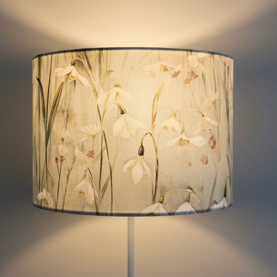 handmade drum lampshade with cotton snowdrop fabric in pale green and blue. handmade lighting in made in UK. lampshade for ceiling, table or floor lamp
